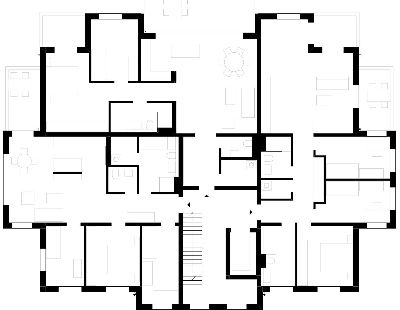 Typical floor plan of the Therese apartment villa: apartments arranged around the central stairwell, with balconies and furniture